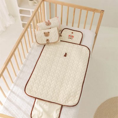 Tapis à langer nomade 